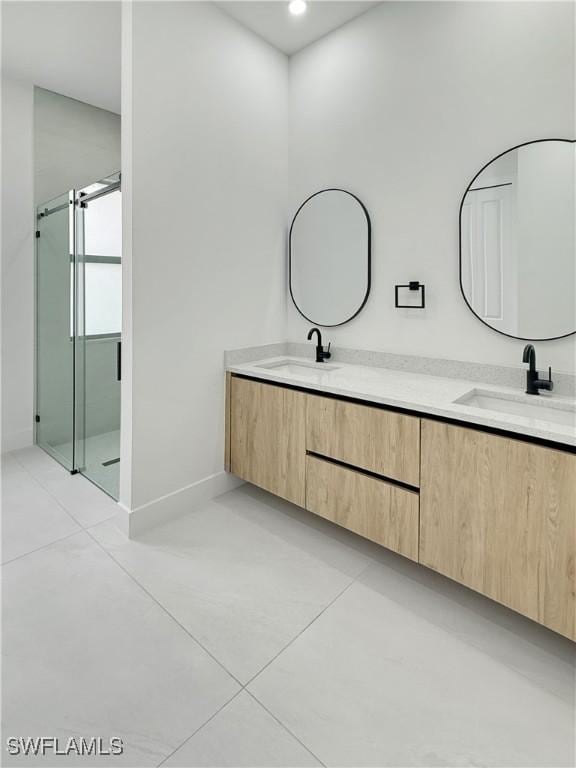3247 72nd Ave NE, Naples, FL 34120 - bathroom featuring double vanity, a stall shower, tile patterned flooring, baseboards, and recessed lighting