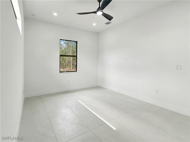 3247 72nd Ave NE, Naples, FL 34120 - spare room with baseboards, recessed lighting, light tile patterned floors, and ceiling fan