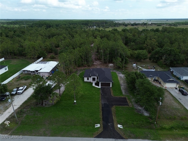 3247 72nd Ave NE, Naples, FL 34120 - aerial view of property's location with a heavily wooded area