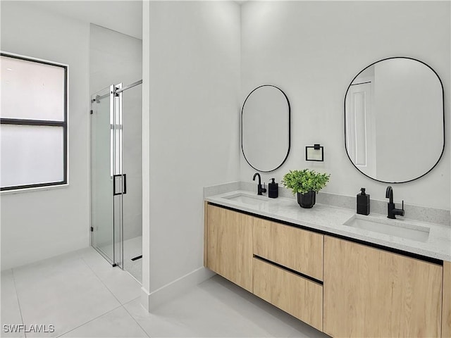 3247 72nd Ave NE, Naples, FL 34120 - bathroom with a stall shower, tile patterned floors, and double vanity