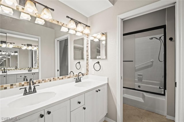 1771 Bermuda Greens Blvd Unit O4, Naples, FL 34110 - full bathroom with double vanity, combined bath / shower with glass door, baseboards, and tile patterned floors