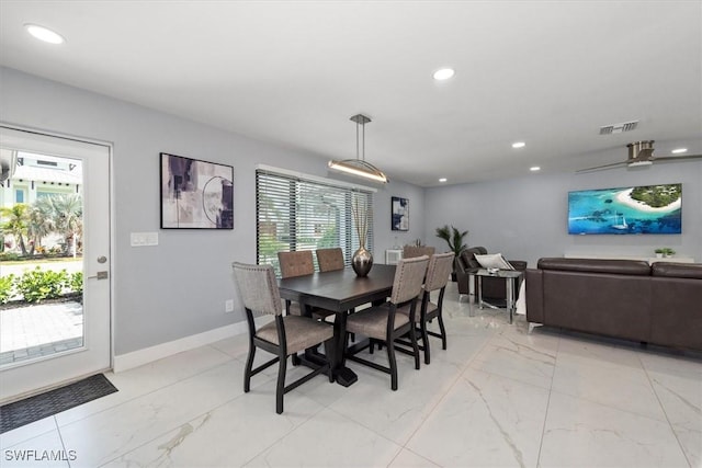 52 Fairview Blvd, Fort Myers Beach, FL 33931 - dining area with light marble finish flooring, recessed lighting, and baseboards