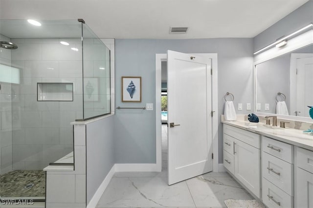 52 Fairview Blvd, Fort Myers Beach, FL 33931 - bathroom featuring baseboards, vanity, walk in shower, and marble finish flooring