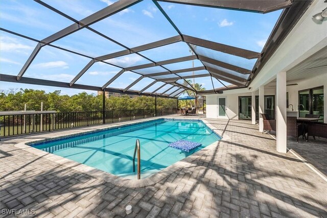 52 Fairview Blvd, Fort Myers Beach, FL 33931 - view of swimming pool featuring a patio area