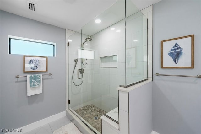 52 Fairview Blvd, Fort Myers Beach, FL 33931 - full bath featuring baseboards, walk in shower, marble look tiles, and recessed lighting