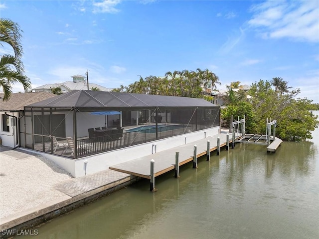 52 Fairview Blvd, Fort Myers Beach, FL 33931 - dock featuring a water view and glass enclosure