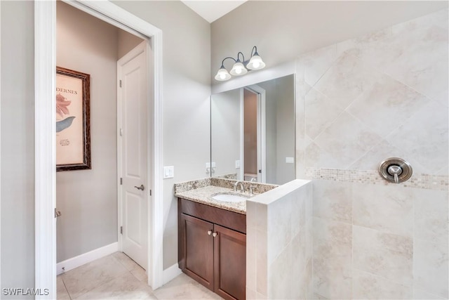 23778 Pebble Pointe Ln, Estero, FL 34135 - bathroom featuring vanity, tile patterned flooring, and baseboards