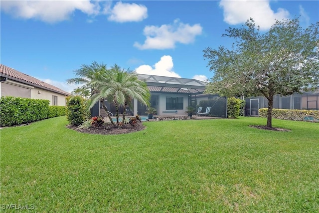 23778 Pebble Pointe Ln, Estero, FL 34135 - rear view of house with a yard and a lanai