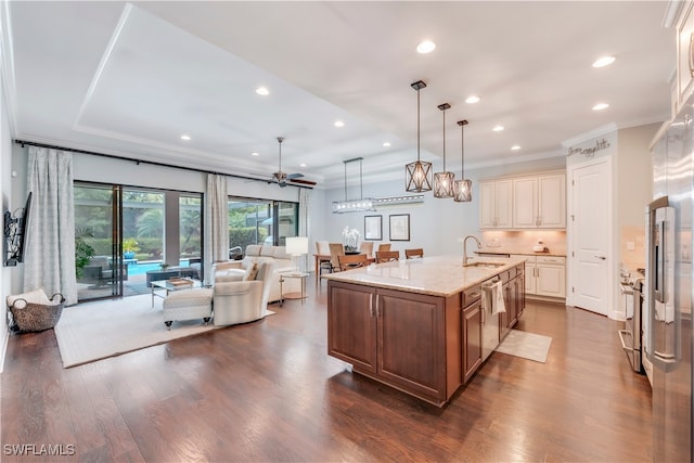23778 Pebble Pointe Ln, Estero, FL 34135 - kitchen with a sink, open floor plan, light stone countertops, dark wood finished floors, and recessed lighting