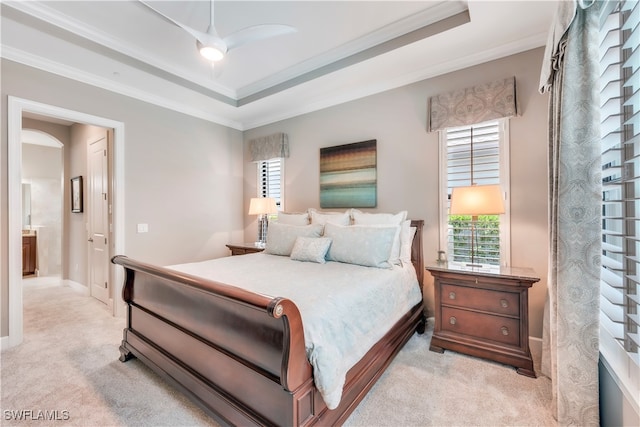 23778 Pebble Pointe Ln, Estero, FL 34135 - bedroom featuring light colored carpet, crown molding, a raised ceiling, and baseboards