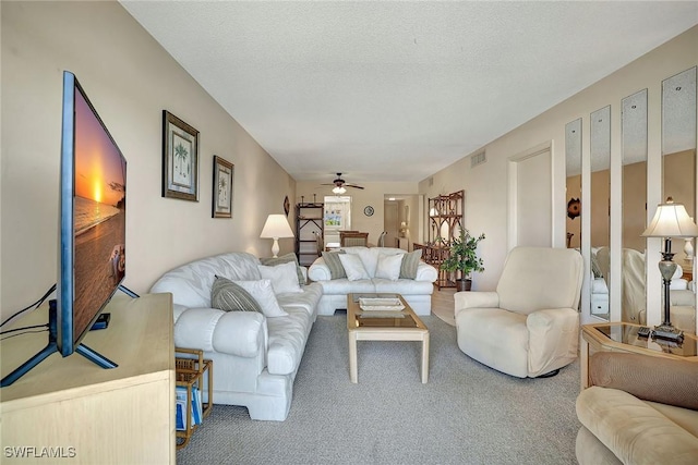 1206 Edington Pl Unit D304, Marco Island, FL 34145 - living room featuring carpet floors and ceiling fan