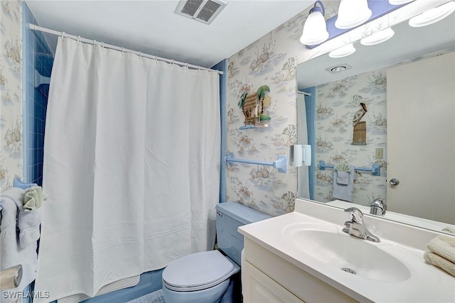 1206 Edington Pl Unit D304, Marco Island, FL 34145 - full bath featuring wallpapered walls, toilet, vanity, and a shower with shower curtain