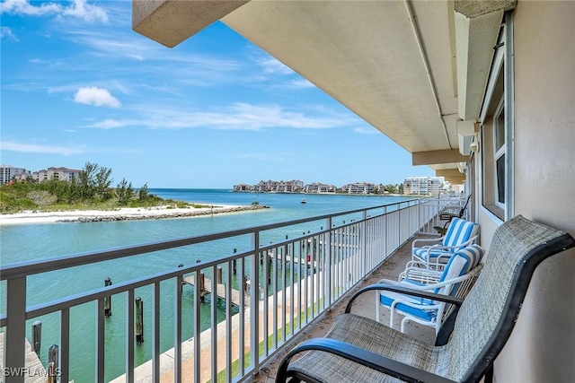 1206 Edington Pl Unit D304, Marco Island, FL 34145 - balcony featuring a water view