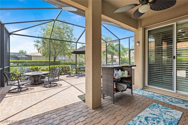 11107 Sparkleberry Dr, Fort Myers, FL 33913 - view of patio / terrace with ceiling fan and a lanai