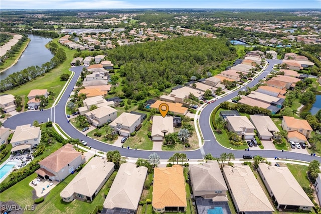11107 Sparkleberry Dr, Fort Myers, FL 33913 - aerial view of property's location with nearby suburban area and a nearby body of water