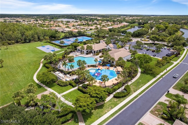 11107 Sparkleberry Dr, Fort Myers, FL 33913 - aerial overview of property's location featuring a pool area and a large body of water