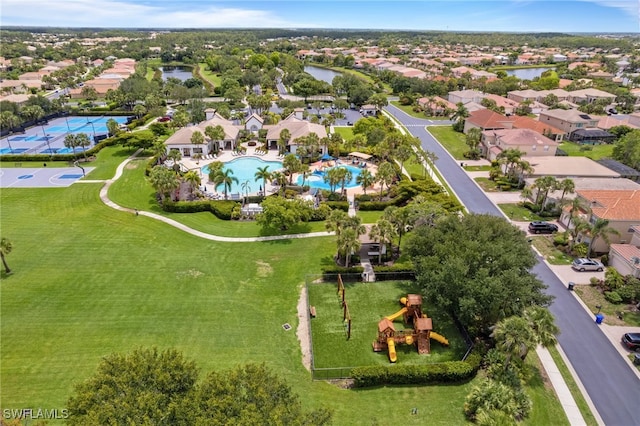 11107 Sparkleberry Dr, Fort Myers, FL 33913 - aerial perspective of suburban area with a pool area and a large body of water