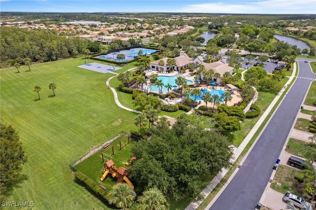 11107 Sparkleberry Dr, Fort Myers, FL 33913 - drone / aerial view of a pool and a nearby body of water