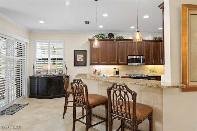 11107 Sparkleberry Dr, Fort Myers, FL 33913 - kitchen with stainless steel appliances, crown molding, a peninsula, backsplash, and light stone counters
