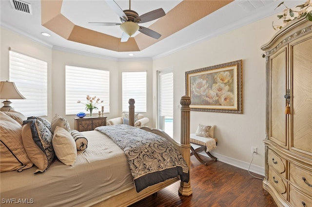 11107 Sparkleberry Dr, Fort Myers, FL 33913 - bedroom featuring baseboards, dark wood finished floors, a tray ceiling, crown molding, and ceiling fan