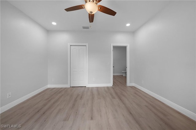 4201 17th St SW, Lehigh Acres, FL 33976 - unfurnished bedroom featuring light wood finished floors, recessed lighting, a closet, and a ceiling fan