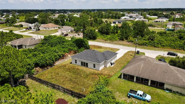 4201 17th St SW, Lehigh Acres, FL 33976 - view of subject property featuring a tree filled landscape