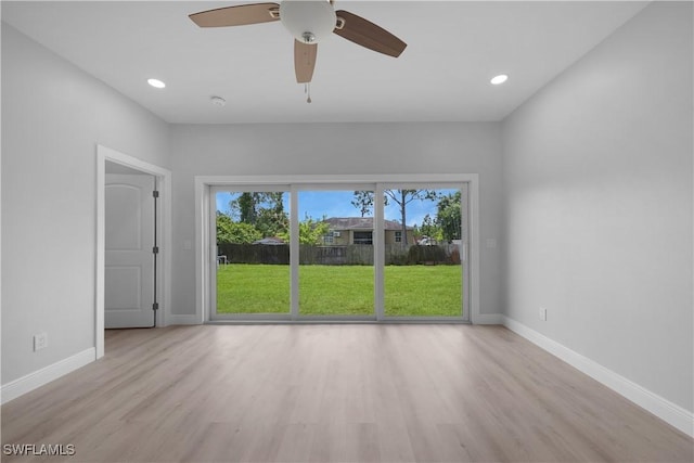 4201 17th St SW, Lehigh Acres, FL 33976 - spare room featuring wood finished floors, ceiling fan, recessed lighting, and a smoke detector