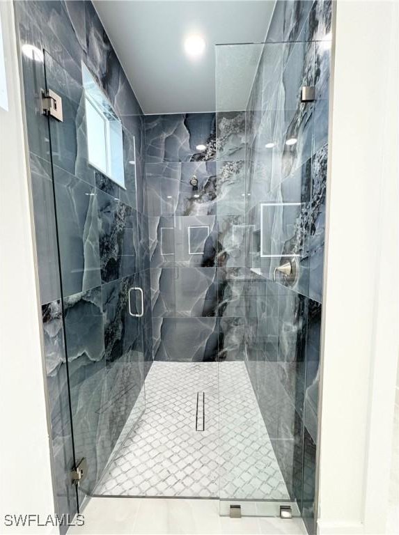 1009 Euclid Ave, Lehigh Acres, FL 33972 - bathroom with a shower stall
