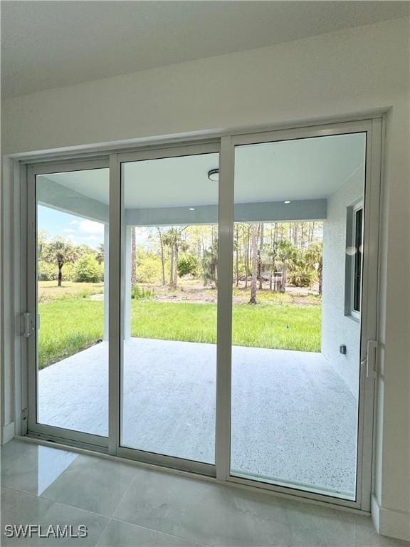 1009 Euclid Ave, Lehigh Acres, FL 33972 - entryway featuring tile patterned flooring