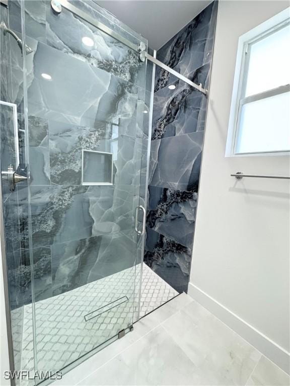1009 Euclid Ave, Lehigh Acres, FL 33972 - full bath with a marble finish shower and marble finish floors