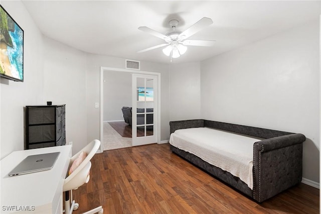 2833 NW 4th Ave, Cape Coral, FL 33993 - bedroom featuring wood finished floors, ceiling fan, and baseboards