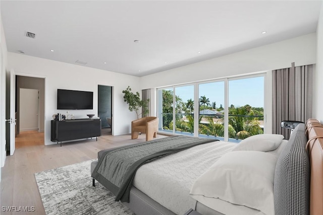 1135 Bluebird Ave, Marco Island, FL 34145 - bedroom featuring light wood finished floors