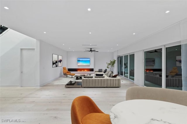 1135 Bluebird Ave, Marco Island, FL 34145 - living room with a ceiling fan, light wood-style flooring, recessed lighting, and baseboards