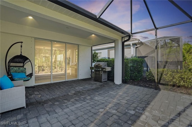 7028 Mistral Way, Fort Myers, FL 33966 - view of patio with a grill and glass enclosure