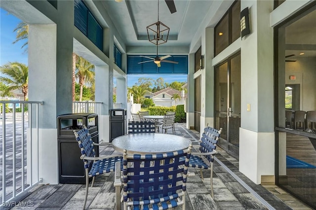 7028 Mistral Way, Fort Myers, FL 33966 - view of patio with a ceiling fan and outdoor dining space