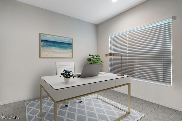 7028 Mistral Way, Fort Myers, FL 33966 - office with baseboards and light tile patterned floors