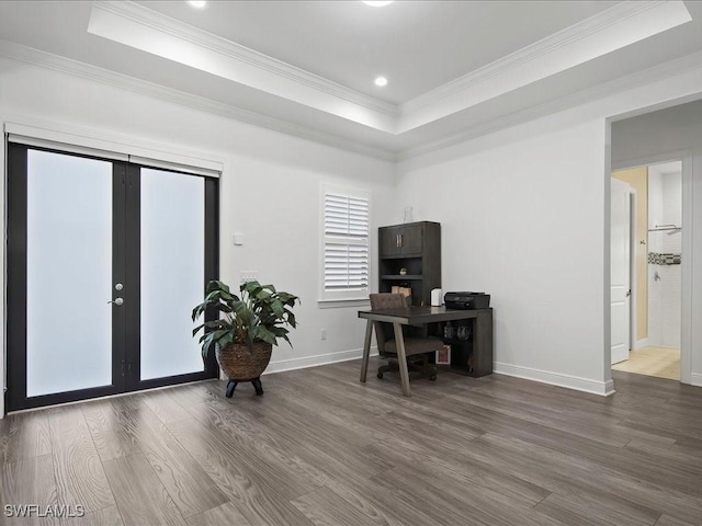 836 14th St SE, Naples, FL 34117 - office area with wood finished floors, a tray ceiling, french doors, baseboards, and crown molding