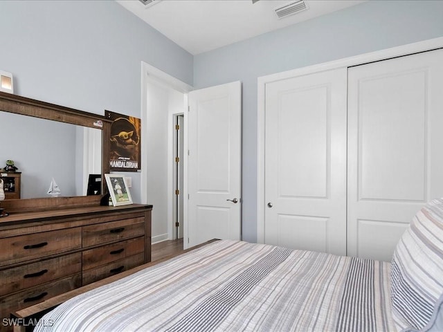 836 14th St SE, Naples, FL 34117 - bedroom with a closet and wood finished floors