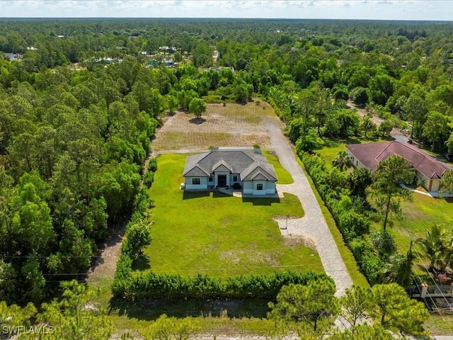 836 14th St SE, Naples, FL 34117 - view of subject property with a forest