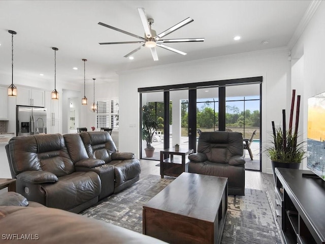 836 14th St SE, Naples, FL 34117 - living area with crown molding, ceiling fan, wood finished floors, and recessed lighting