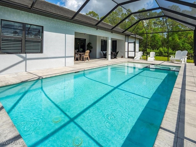 836 14th St SE, Naples, FL 34117 - view of pool with a patio, a pool with connected hot tub, and glass enclosure