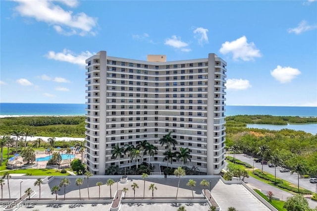 440 Seaview Ct Unit 405, Marco Island, FL 34145 - view of apartment building / complex with a water view