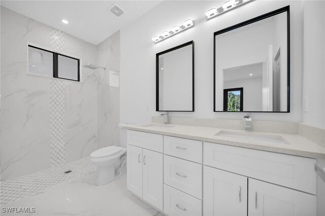 3201 14th St W, Lehigh Acres, FL 33971 - bathroom with marble finish floors, a marble finish shower, toilet, double vanity, and recessed lighting