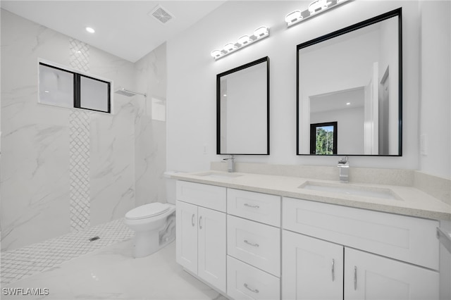 3201 14th St W, Lehigh Acres, FL 33971 - full bathroom with a marble finish shower, marble look tile flooring, toilet, double vanity, and recessed lighting