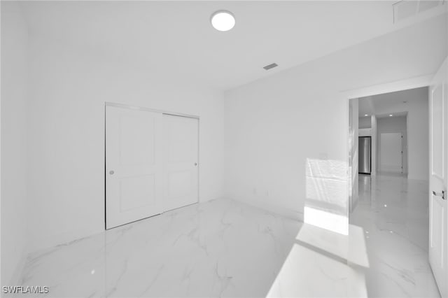 3201 14th St W, Lehigh Acres, FL 33971 - empty room featuring light marble finish flooring