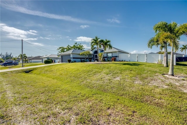 1812 SW 10th Ter, Cape Coral, FL 33991 - view of front facade featuring an attached garage and driveway