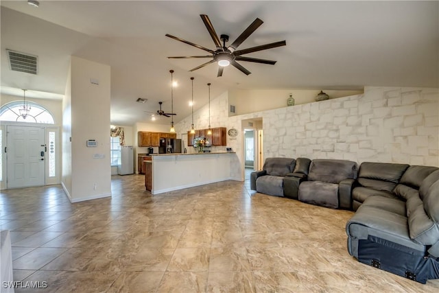 1812 SW 10th Ter, Cape Coral, FL 33991 - living room with ceiling fan, a chandelier, and high vaulted ceiling