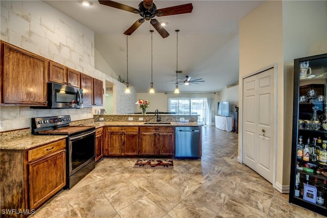 1812 SW 10th Ter, Cape Coral, FL 33991 - kitchen featuring stainless steel appliances, a ceiling fan, a sink, a peninsula, and high vaulted ceiling