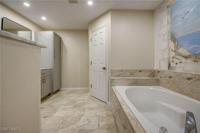 1812 SW 10th Ter, Cape Coral, FL 33991 - full bath with a bath, recessed lighting, vanity, and marble look tiles