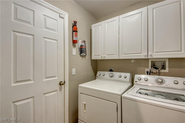 1812 SW 10th Ter, Cape Coral, FL 33991 - washroom with washing machine and dryer and cabinet space